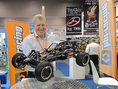 Owner displaying remote control hobby car