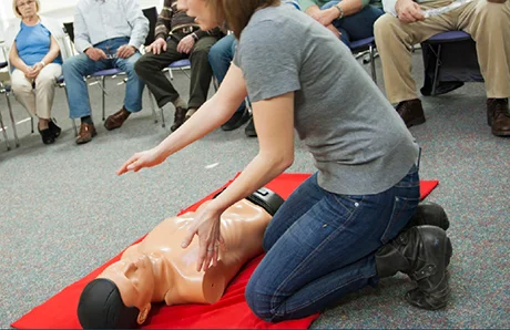 Practical Outcomes trainer delivering first aid course